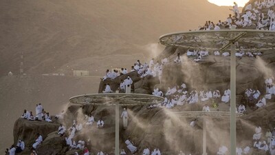 Water mist is sprayed on Muslim pilgrims as they pray on the rocky hill known as the Mountain of Mercy, on the Plain of Arafat, during the annual Hajj pilgrimage, near the holy city of Mecca, Saudi Arabia, on June 27, 2023. Hajj 2024: Step-by-step guide to rituals of Muslims' pilgrimage to Mecca in Saudi Arabia, their meanings and symbolism (AP Photo/Amr Nabil, File) Water mist is sprayed on Muslim pilgrims as they pray on the rocky hill known as the Mountain of Mercy, on the Plain of Arafat, during the annual Hajj pilgrimage, near the holy city of Mecca, Saudi Arabia, on June 27, 2023. Hajj 2024: Step-by-step guide to rituals of Muslims' pilgrimage to Mecca in Saudi Arabia, their meanings and symbolism (AP Photo/Amr Nabil, File)
