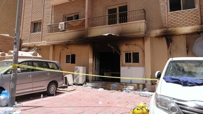 A picture shows a building which was ingulfed by fire, in Kuwait City, on June 12, 2024. More than 35 people were killed and dozens injured in a building fire in an area heavily populated with foreign workers in Kuwait, the interior ministry said. (Photo by YASSER AL-ZAYYAT / AFP) A picture shows a building which was ingulfed by fire, in Kuwait City, on June 12, 2024. More than 35 people were killed and dozens injured in a building fire in an area heavily populated with foreign workers in Kuwait, the interior ministry said. (Photo by YASSER AL-ZAYYAT / AFP)