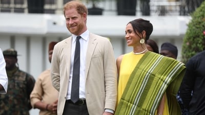 Royal family ‘needs a shake-up’ after ‘losing Prince Harry and Meghan Markle,’ an expert has said (Photo by Kola SULAIMON / AFP) (AFP) Royal family ‘needs a shake-up’ after ‘losing Prince Harry and Meghan Markle,’ an expert has said (Photo by Kola SULAIMON / AFP) (AFP)