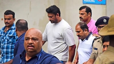 Kannada actor Darshan Thugadeepa in Bengaluru after being arrested by police over his alleged connection with a murder case. (PTI) Kannada actor Darshan Thugadeepa in Bengaluru after being arrested by police over his alleged connection with a murder case. (PTI)