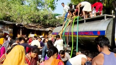 New Delhi: Locals collect water from a tanker amid water crisis. (PTI) New Delhi: Locals collect water from a tanker amid water crisis. (PTI)