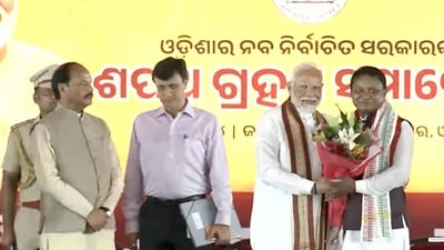 Prime Minister Narendra Modi with Odisha's Chief Minister-designate Mohan Charan Majhi during the latter's swearing-in ceremony in Bhubaneswar on June 12, 2024. (PTI)