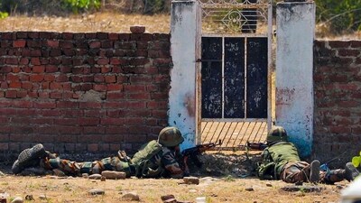 Security forces near the site of an encounter between security forces and militants, at Saida village in Kathua's Hiranagar sector. (HT Photo)