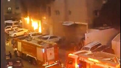 Smoke billows after a fire broke out in a building, in Mangaf, Kuwait, on Wednesday. (PTI) Smoke billows after a fire broke out in a building, in Mangaf, Kuwait, on Wednesday. (PTI)