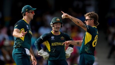 Australia's bowler Adam Zampa, right, talks to his captain Mitchell Marsh and wicket keeper Matthew Wade (AP) Australia's bowler Adam Zampa, right, talks to his captain Mitchell Marsh and wicket keeper Matthew Wade (AP)