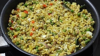 Millet upma: Sauté mustard seeds, curry leaves, and chopped vegetables like carrots, peas, and bell peppers. Add cooked millet and season with salt, turmeric, and other spices. Garnish with cilantro. (Pinterest) Millet upma: Sauté mustard seeds, curry leaves, and chopped vegetables like carrots, peas, and bell peppers. Add cooked millet and season with salt, turmeric, and other spices. Garnish with cilantro. (Pinterest)