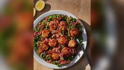Indulge in scallop recipe with peas and prosciutto: A high-end campfire delight (AP photo) Indulge in scallop recipe with peas and prosciutto: A high-end campfire delight (AP photo)