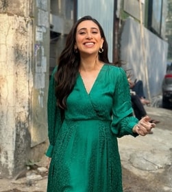 Karisma Kapoor dons a green maxi dress featuring puffed sleeves (Photo: Instagram) Karisma Kapoor dons a green maxi dress featuring puffed sleeves (Photo: Instagram)