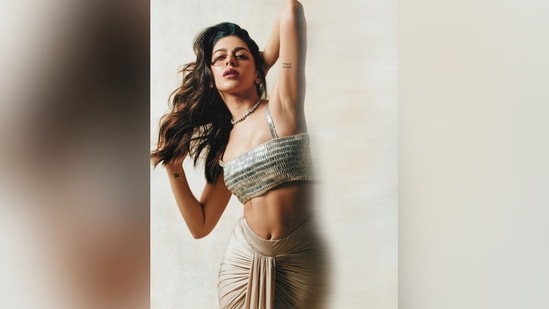 Assisted by hairstylist Madhav Trehan, Alaya styled her luscious long tresses into soft curls and left them open in a side parting, allowing them to beautifully cascade down her shoulders and perfectly complement her chic look.(Instagram/@alayaf)