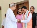 Odisha CM Mohan Charan Majhi greets former state chief minister Naveen Patnaik at Naveen Niwas on June 12.(ANI)