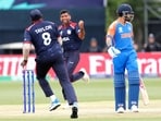 USA's Saurabh Netravalkar celebrates the dismissal of India's Virat Kohli USA's Saurabh Netravalkar celebrates the dismissal of India's Virat Kohli