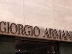 The logo of fashion house Giorgio Armani is seen outside a shop in Milan, Italy. 