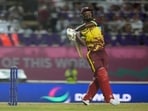 West Indies' Sherfane Rutherford bats during the men's T20 World Cup cricket match between the West Indies and New Zealand at the Brian Lara Cricket Academy