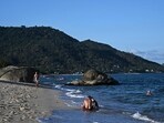 People relax on the Lamai beach on Koh Samui island in the southern Thai province of Surat Thani. (AFP)