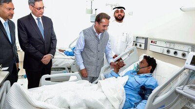 Union Minister of State for External Affairs Kirti Vardhan Singh meets with an Indian who was injured in the Mangaf fire incident, at Jaber Hospital, in Kuwait on Thursday. (ANI Photo) (India in Kuwait-X) Union Minister of State for External Affairs Kirti Vardhan Singh meets with an Indian who was injured in the Mangaf fire incident, at Jaber Hospital, in Kuwait on Thursday. (ANI Photo) (India in Kuwait-X)