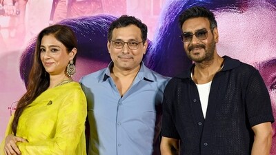 Actors Tabu and Ajay Devgn shared a candid moment with writer and director Neeraj Pandey at the trailer launch. (AFP)