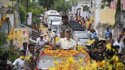 Andhra Pradesh Chief Minister N Chandrababu Naidu being greeted by supporters while on his way to take charge at the Secretariat, in Amravati on Thursday. (PTI) Andhra Pradesh Chief Minister N Chandrababu Naidu being greeted by supporters while on his way to take charge at the Secretariat, in Amravati on Thursday. (PTI)