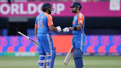 India's Rohit Sharma celebrates with Virat Kohli after hitting a six. (REUTERS)