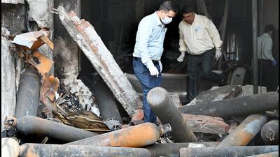 Forensic team at the site of the fire at the Newborn Baby Care Hospital, at Vivek Vihar. (Arvind Yadav/HT Photo) Forensic team at the site of the fire at the Newborn Baby Care Hospital, at Vivek Vihar. (Arvind Yadav/HT Photo)