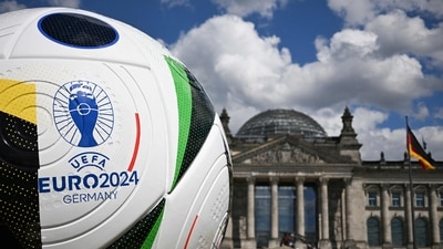 A giant ball of the upcoming UEFA Euro 2024 European Football Championship stands in front of the Reichstag building that houses the Bundestag (AFP) A giant ball of the upcoming UEFA Euro 2024 European Football Championship stands in front of the Reichstag building that houses the Bundestag (AFP)