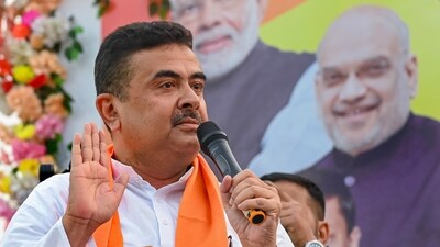 BJP's Suvendhu and 'post-poll violence victims stopped from entering Raj Bhavan (PTI) BJP's Suvendhu and 'post-poll violence victims stopped from entering Raj Bhavan (PTI)