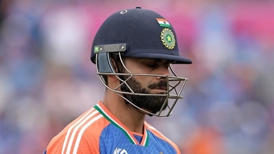 India's Virat Kohli reacts as he walks off the field after losing his wicket (PTI) India's Virat Kohli reacts as he walks off the field after losing his wicket (PTI)