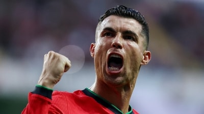 Portugal's Cristiano Ronaldo celebrates scoring their third goal (REUTERS)