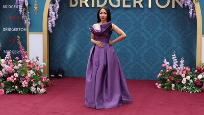 Kathryn Drysdale, who plays the role of Genevieve Delacroix, attended the Bridgerton Season 3 Part 2 premiere in London. True to her famed dressmaker character in the series, she made heads turn in a purple strapless gown and striking makeup.&nbsp; (REUTERS)