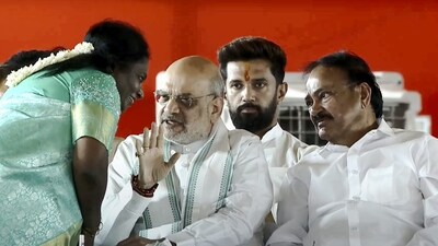 Former Vice President Venkaiah Naidu and Union Ministers Amit Shah and Chirag Paswan with BJP leader Tamilisai Soundararajan at the swearing-in ceremony of Chandrababu Naidu as the Chief Minister of Andhra Pradesh. (PTI) Former Vice President Venkaiah Naidu and Union Ministers Amit Shah and Chirag Paswan with BJP leader Tamilisai Soundararajan at the swearing-in ceremony of Chandrababu Naidu as the Chief Minister of Andhra Pradesh. (PTI)