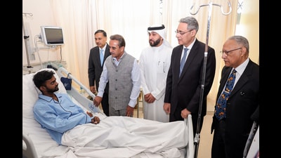 Union Minister of State for External Affairs Kirti Vardhan Singh meets with an Indian who was injured in the Mangaf fire incident, at Jaber Hospital, in Kuwait on Thursday. (ANI Photo) (India in Kuwait-X)
