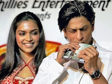 Deepika Padukone with Shah Rukh Khan during Om Shanti Om audio launch. Deepika Padukone with Shah Rukh Khan during Om Shanti Om audio launch.