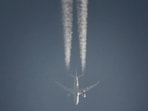 A Boeing 787-8 flies over Dombivli in Thane district, in an image captured by Roshan Rajeev.