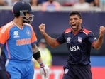 United States' Saurabh Nethralvakar, right, celebrates the dismissal of India's Virat Kohli, left, during the ICC Men's T20 World Cup cricket match between United States and India at the Nassau County International Cricket United States' Saurabh Nethralvakar, right, celebrates the dismissal of India's Virat Kohli, left, during the ICC Men's T20 World Cup cricket match between United States and India at the Nassau County International Cricket