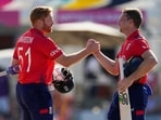 England's captain Jos Buttler, right, and batting partner Jonny Bairstow shake hands at the end of the match. England's captain Jos Buttler, right, and batting partner Jonny Bairstow shake hands at the end of the match.