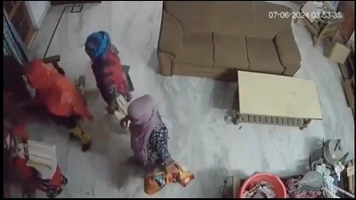 A screengrab from CCTV footage showing the gang of armed woman entering a house on June 7