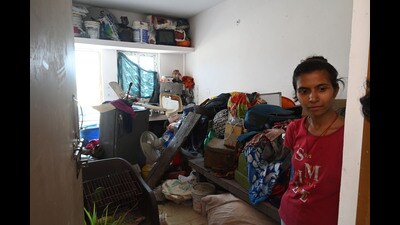 As one enters this new settlement, people can be seen either trying to fit in their belongings into their one-bedroom flats or sitting with things outside their partially completed flats. (Deepak Gupta/HT Photo) As one enters this new settlement, people can be seen either trying to fit in their belongings into their one-bedroom flats or sitting with things outside their partially completed flats. (Deepak Gupta/HT Photo)