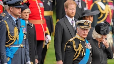 King Charles III, front right, Camilla, the Queen Consort, Prince Harry and Prince William watch as the coffin of Queen Elizabeth II is placed into the hearse following the state funeral service in Westminster Abbey in central London Monday Sept. 19, 2022. (AP Photo/Martin Meissner, Pool, File) (AP) King Charles III, front right, Camilla, the Queen Consort, Prince Harry and Prince William watch as the coffin of Queen Elizabeth II is placed into the hearse following the state funeral service in Westminster Abbey in central London Monday Sept. 19, 2022. (AP Photo/Martin Meissner, Pool, File) (AP)