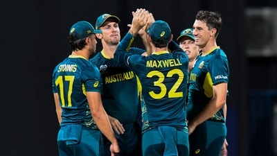 Australia's captain Mitchell Marsh (2L) and Australia's Pat Cummins celebrate the dismissal of Namibia's Jan Frylinck during the ICC men's Twenty20 World Cup 2024 group B cricket match (AFP) Australia's captain Mitchell Marsh (2L) and Australia's Pat Cummins celebrate the dismissal of Namibia's Jan Frylinck during the ICC men's Twenty20 World Cup 2024 group B cricket match (AFP)