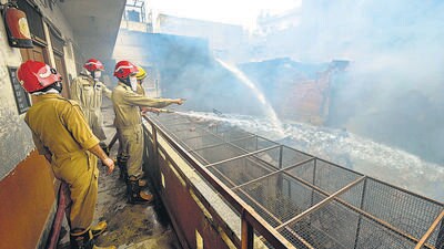 Firefighters continue to douse the fire a day after it broke out at the Marwari Katra market, in Chandni Chowk on Friday. (Raj K Raj/HT Photo) Firefighters continue to douse the fire a day after it broke out at the Marwari Katra market, in Chandni Chowk on Friday. (Raj K Raj/HT Photo)