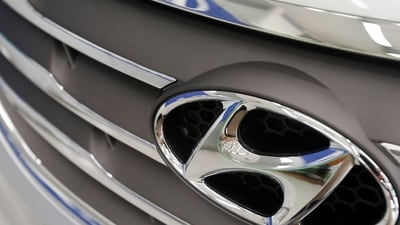 The logo of Hyundai Motor is seen on a car displayed at a Hyundai dealership in Seoul. (Reuters)