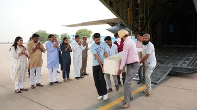 The Indian Air Force (IAF) aircraft carrying bodies of Indian citizens who died in the Kuwait fire mishap landed at the Palam airbase The Indian Air Force (IAF) aircraft carrying bodies of Indian citizens who died in the Kuwait fire mishap landed at the Palam airbase