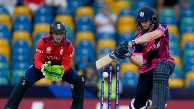 Scotland's Michael Jones plays a shot from a delivery of England's Moeen Ali (PTI) Scotland's Michael Jones plays a shot from a delivery of England's Moeen Ali (PTI)
