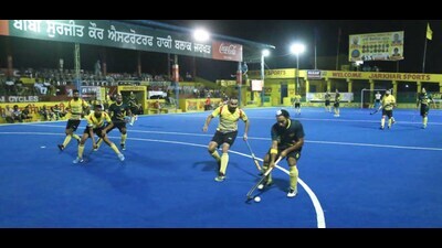 Players in action during the 4th Olympian Prithipal Singh Hockey Festival in Ludhiana on Friday. (HT Photo)