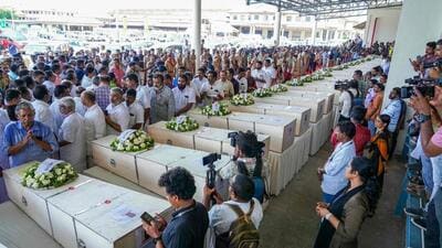 Relatives mourn near the deceased after the coffins' arrival on an Indian Air Force plane from Kuwait at the Cochin International Airport in Kochi on June 14. (AFP) Relatives mourn near the deceased after the coffins' arrival on an Indian Air Force plane from Kuwait at the Cochin International Airport in Kochi on June 14. (AFP)