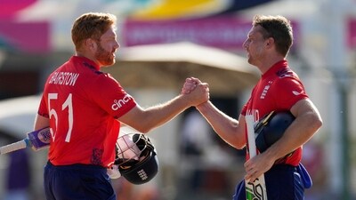 England's captain Jos Buttler, right, and batting partner Jonny Bairstow shake hands at the end of the match. (AP) England's captain Jos Buttler, right, and batting partner Jonny Bairstow shake hands at the end of the match. (AP)