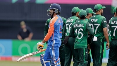 India's Ravindra Jadeja, left, walks off the field after losing his wicket against Pakistan (AP) India's Ravindra Jadeja, left, walks off the field after losing his wicket against Pakistan (AP)