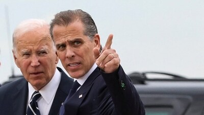 U.S. President Joe Biden stands with his son Hunter Biden, who earlier in the day was found guilty on all three counts in his criminal gun charges trial, after President Biden arrived at the Delaware Air National Guard Base in New Castle, Delaware, U.S., June 11, 2024. REUTERS/Anna Rose Layden (REUTERS)