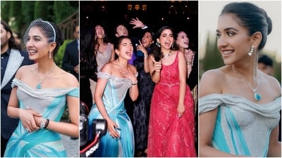 The off-the-shoulder neckline, a bodycon corset-style bodice, and an asymmetrical skirt added to the beauty of Radhika's custom Versace gown. She accessorised the dress with Lorraine Schwartz jewellery pieces, including drop earrings, a necklace, a ring, and a bracelet. Meanwhile, the neckpiece includes blue opal, Radhika's birthstone, and diamonds, Anant's birthstone. (German Larkin, Instagram/@dietsabya) The off-the-shoulder neckline, a bodycon corset-style bodice, and an asymmetrical skirt added to the beauty of Radhika's custom Versace gown. She accessorised the dress with Lorraine Schwartz jewellery pieces, including drop earrings, a necklace, a ring, and a bracelet. Meanwhile, the neckpiece includes blue opal, Radhika's birthstone, and diamonds, Anant's birthstone. (German Larkin, Instagram/@dietsabya)