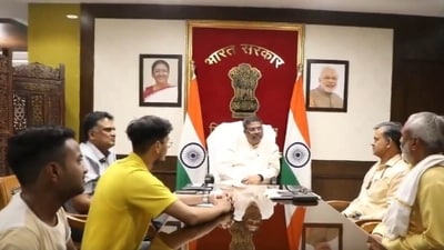 Union Education Minister Dharmendra Pradhan with students and their parents. (ANI) Union Education Minister Dharmendra Pradhan with students and their parents. (ANI)