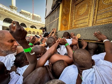 Muslim worshippers touch the Kaaba, Islam's holiest shrine, at the Grand Mosque in Saudi Arabia's holy city of Mecca. (AFP) Muslim worshippers touch the Kaaba, Islam's holiest shrine, at the Grand Mosque in Saudi Arabia's holy city of Mecca. (AFP)